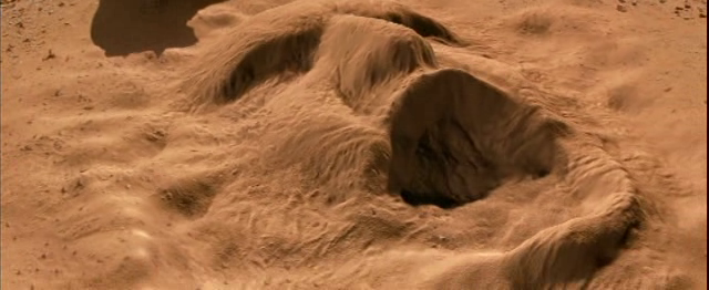 The-Mummy-1999-sand-face.png